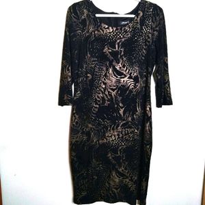 Michael Tyler black dress with metalic gold pattern.